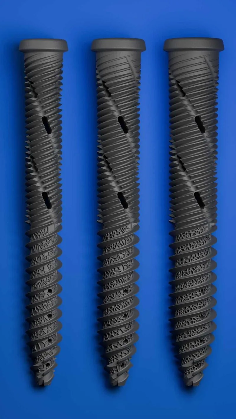 Three 3D printed titanium bone screws with porous lattice sections