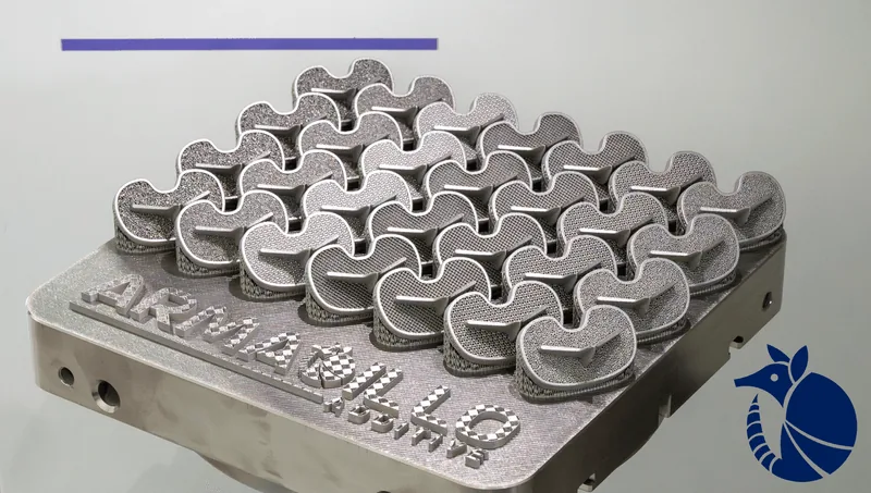 A build plate of 3D printed titanium cervical cages with porous lattice bodies