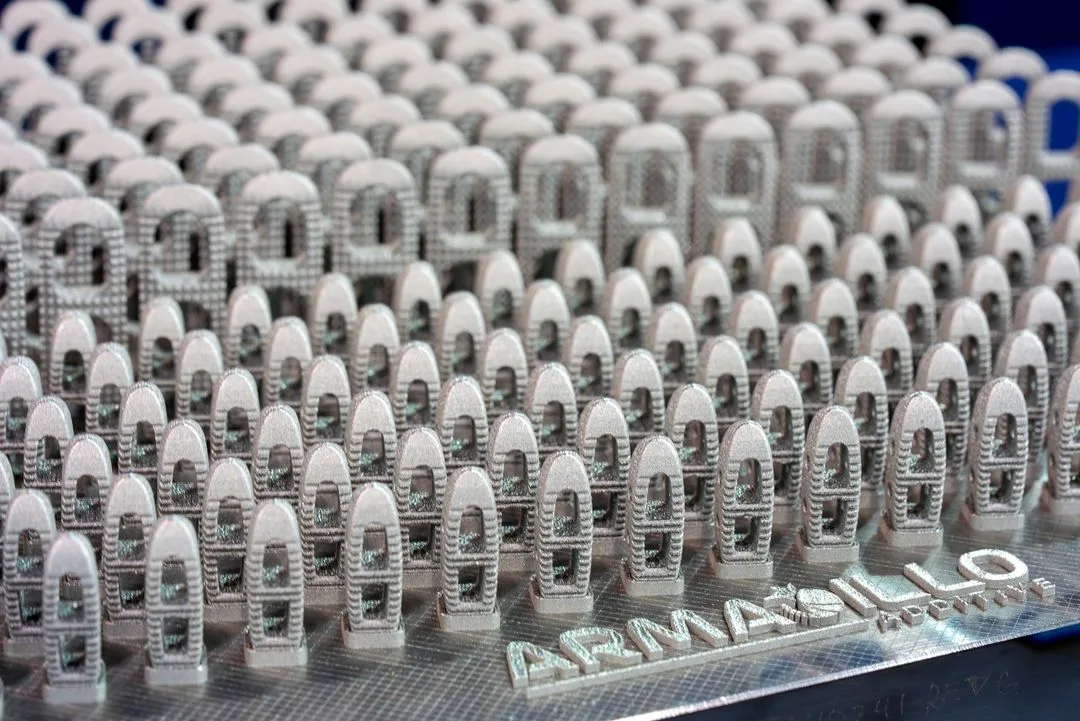 A dense build plate of 3D printed titanium spinal cage implants with lattice bodies