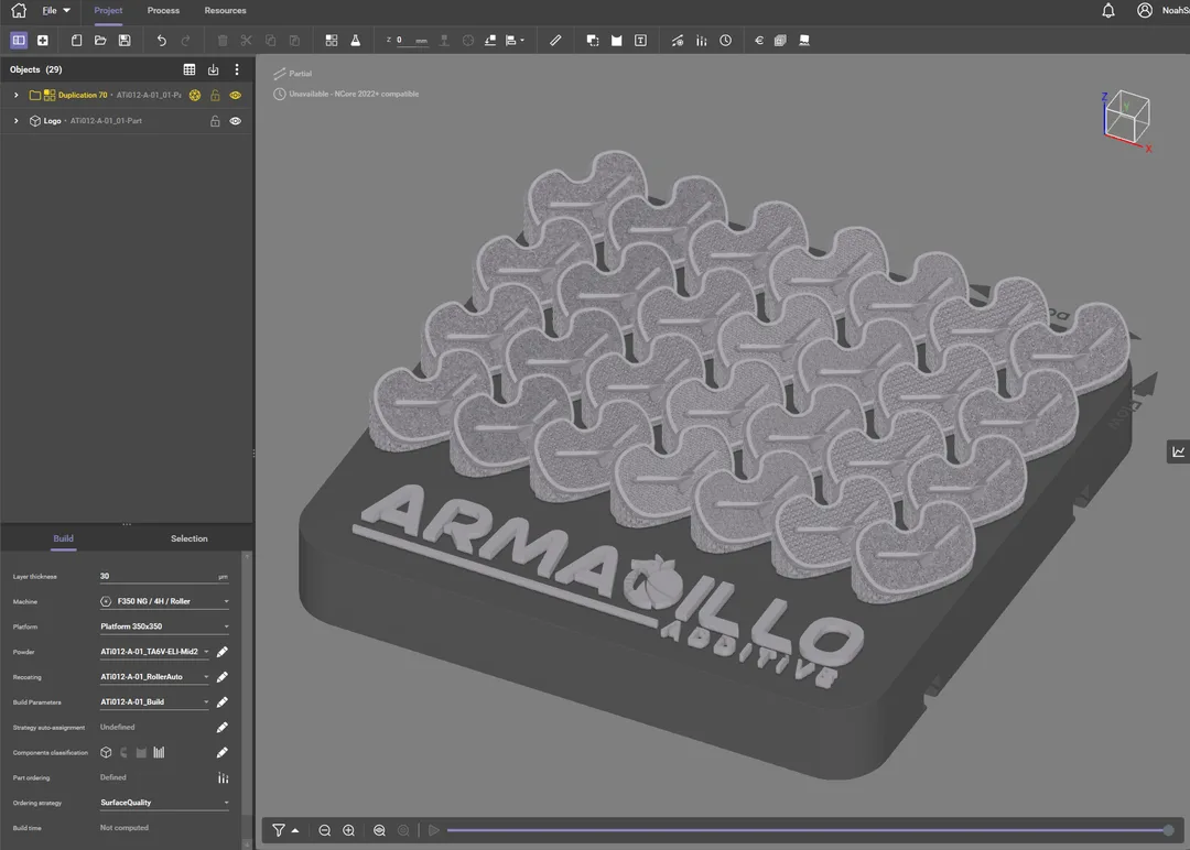 Titanium tibial tray build laid out in AddUp build preparation software